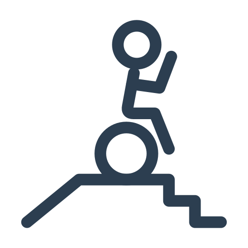 A person in a wheelchair at the top of a set of stairs representing folks with disabilities overcoming barriers.
