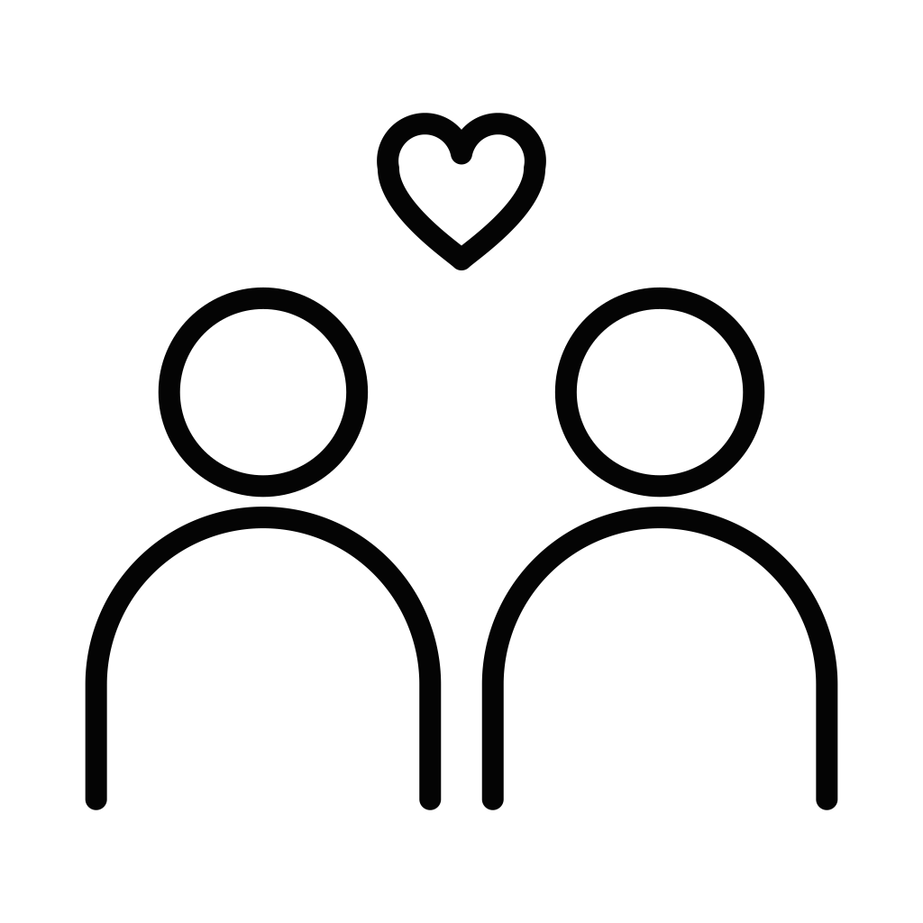 Two people with a heart between them representing couple's or relational counseling.
