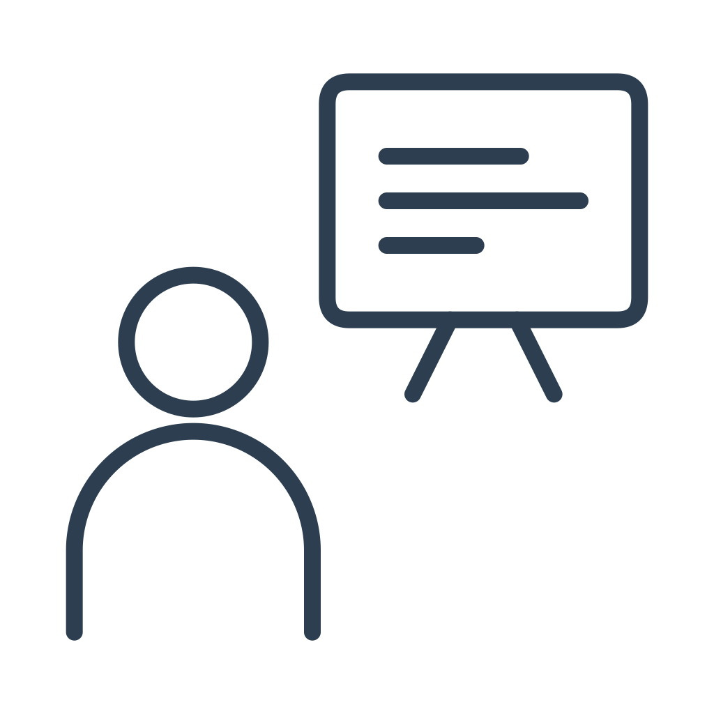 A person in front of a screen with text, representing trainings and workshops.